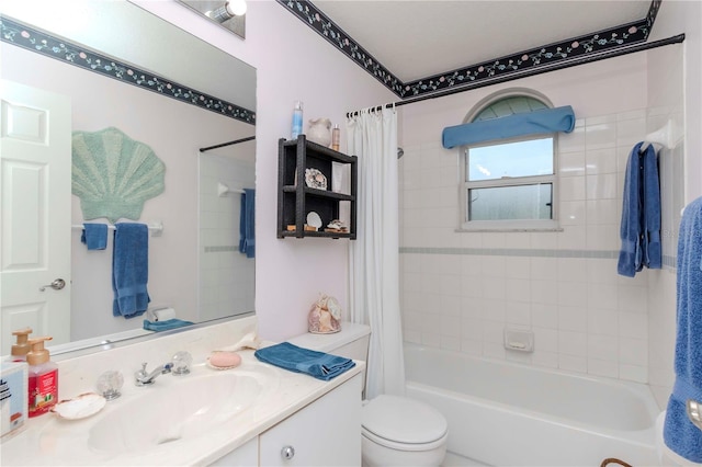 full bathroom with vanity, shower / bathtub combination with curtain, and toilet