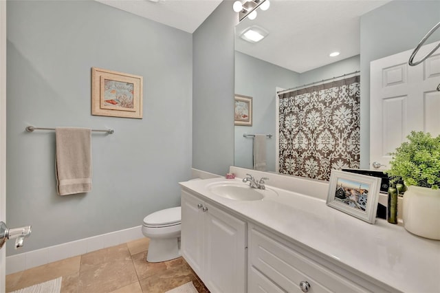 bathroom featuring a shower with curtain, vanity, tile patterned floors, and toilet