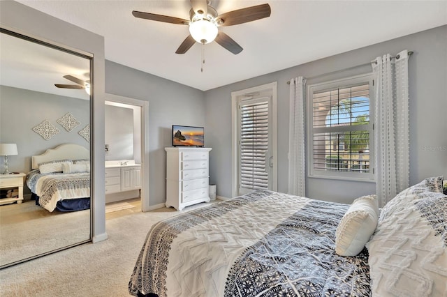 bedroom featuring light carpet, ceiling fan, and baseboards