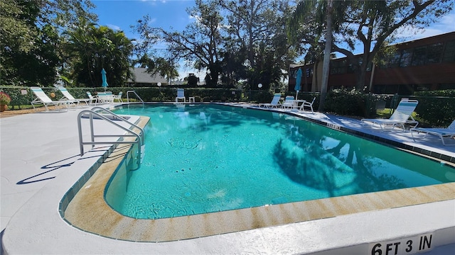 view of swimming pool featuring a patio