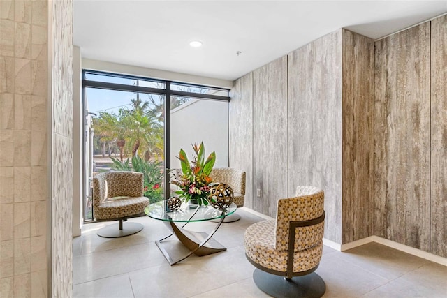 sitting room featuring light tile patterned flooring