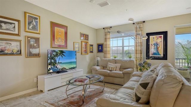 living room featuring a wealth of natural light