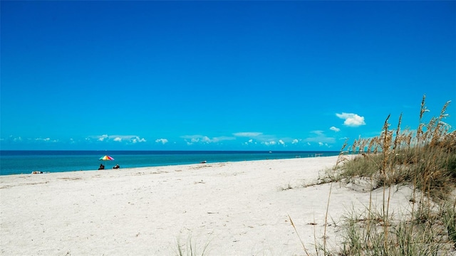 property view of water featuring a view of the beach