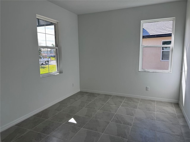 view of tiled spare room