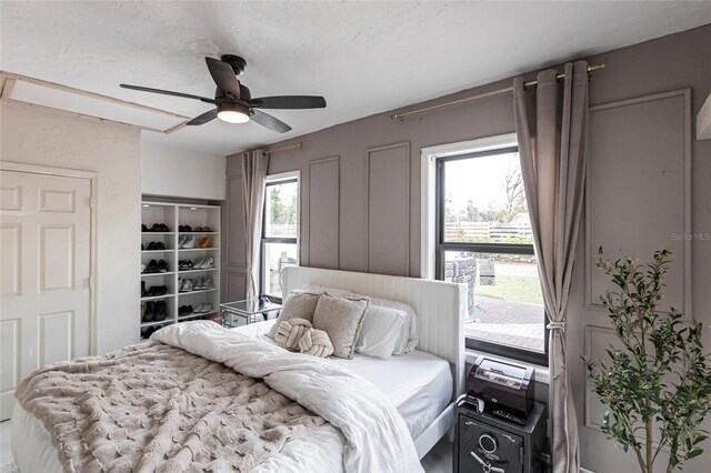 bedroom featuring ceiling fan