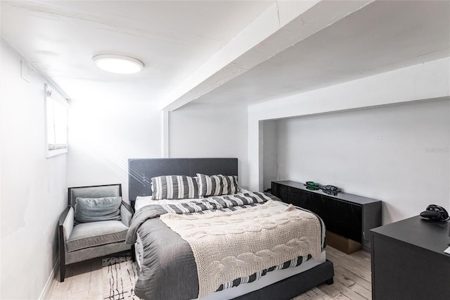 bedroom with light wood-type flooring