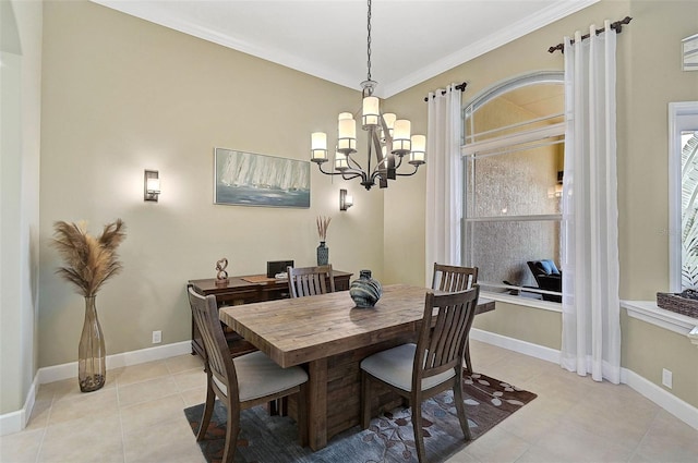 dining room with crown molding, light tile patterned floors, and a notable chandelier