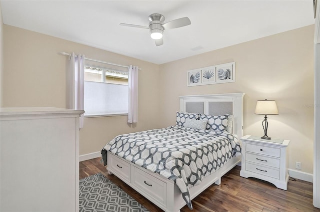 bedroom featuring dark hardwood / wood-style floors and ceiling fan