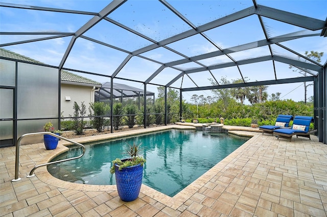 view of swimming pool with a patio, a jacuzzi, and glass enclosure