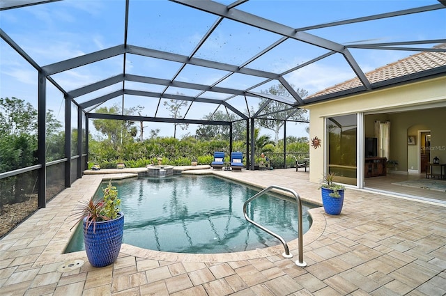 view of pool featuring a lanai and a patio area