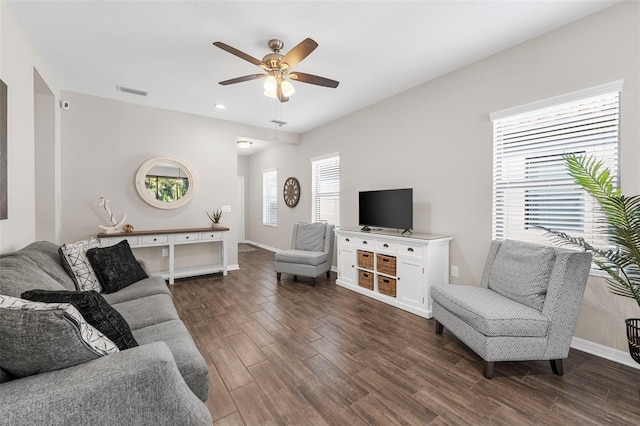 living room featuring ceiling fan