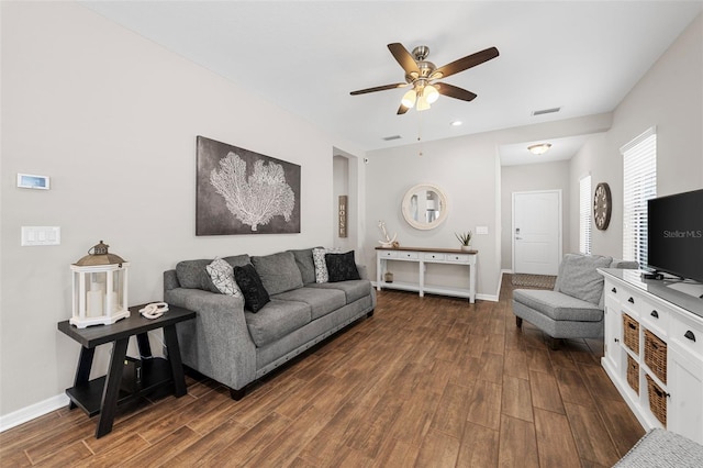 living room featuring ceiling fan