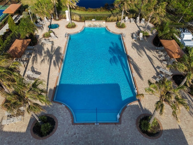 view of swimming pool featuring a patio area