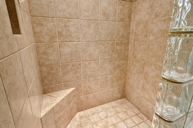 bathroom featuring tiled shower