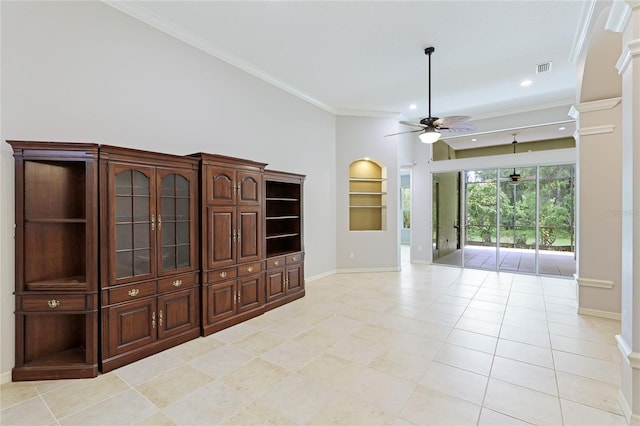 unfurnished living room with built in shelves, ornamental molding, ceiling fan, and light tile patterned flooring