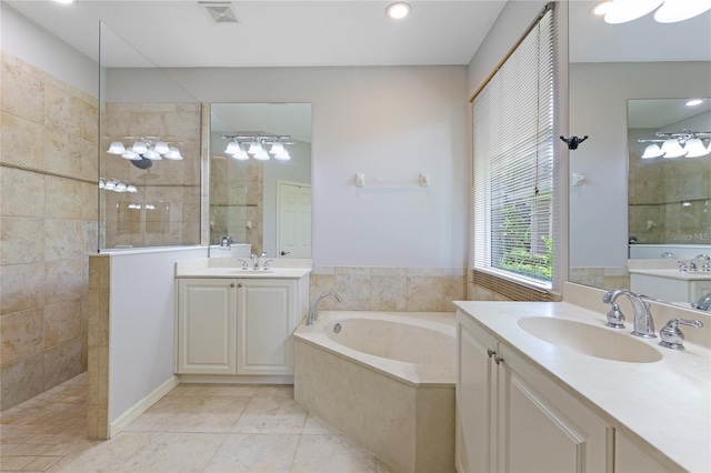 bathroom with vanity, separate shower and tub, and tile patterned flooring