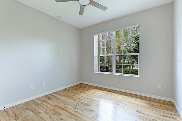 unfurnished room with ceiling fan and light hardwood / wood-style floors