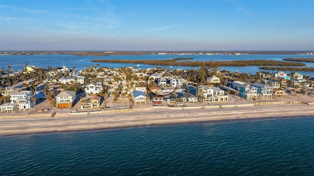 birds eye view of property featuring a water view and a residential view