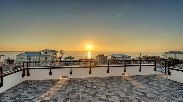 view of patio terrace at dusk