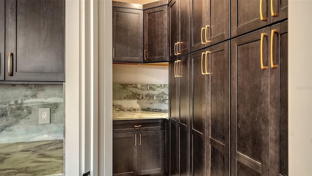 kitchen with dark brown cabinetry