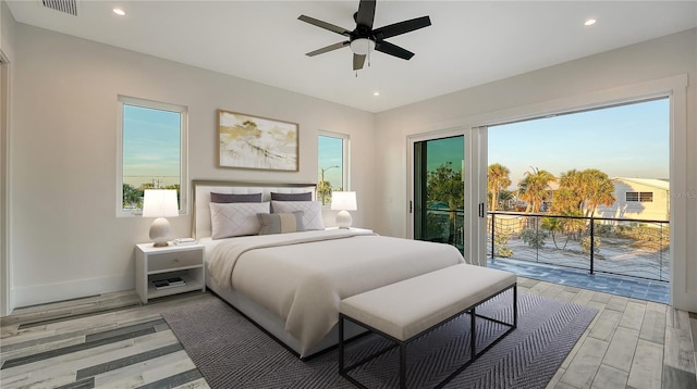 bedroom with light wood finished floors, visible vents, baseboards, access to outside, and recessed lighting