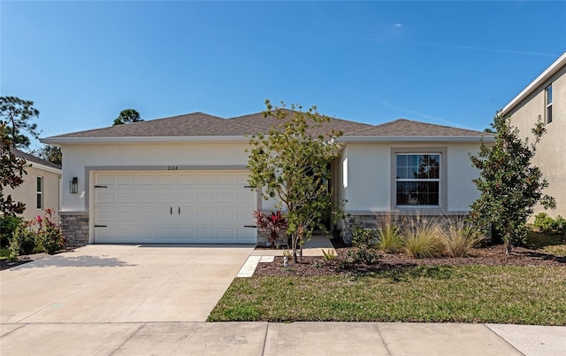 view of front of home with a garage