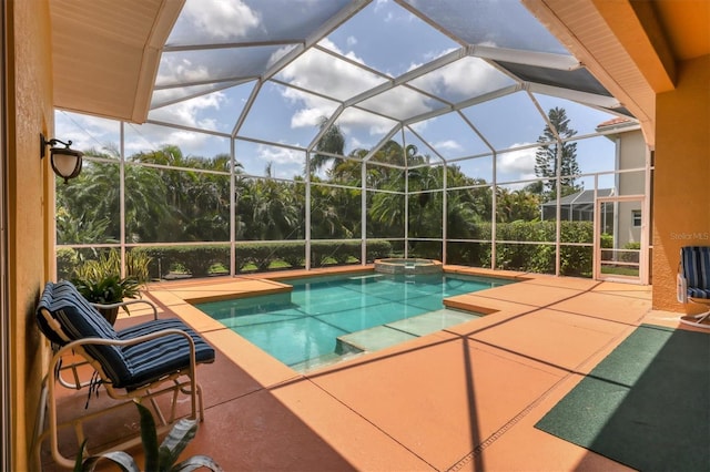 2773 Harvest Dr, Sarasota, FL 34240 - view of swimming pool with a pool with connected hot tub, glass enclosure, and a patio