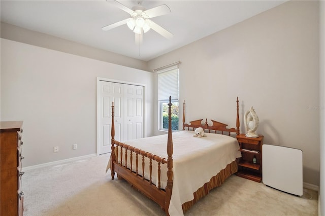 2773 Harvest Dr, Sarasota, FL 34240 - bedroom featuring a ceiling fan, baseboards, a closet, and light colored carpet
