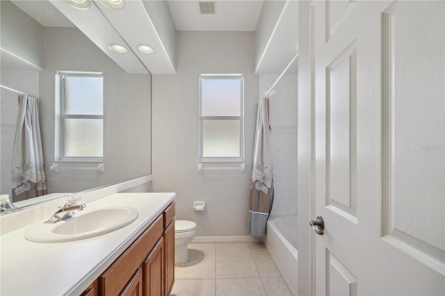 2773 Harvest Dr, Sarasota, FL 34240 - full bathroom featuring visible vents, tile patterned floors, toilet, and plenty of natural light