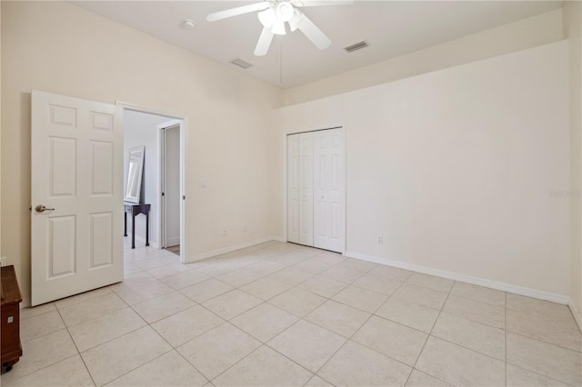 2773 Harvest Dr, Sarasota, FL 34240 - unfurnished room featuring light tile patterned floors, baseboards, ceiling fan, and visible vents