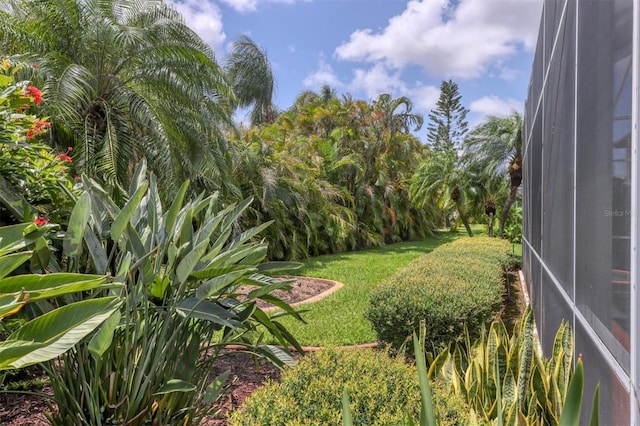 2773 Harvest Dr, Sarasota, FL 34240 - view of yard featuring glass enclosure