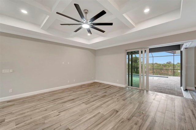 unfurnished room featuring coffered ceiling, ornamental molding, beamed ceiling, ceiling fan, and light hardwood / wood-style floors