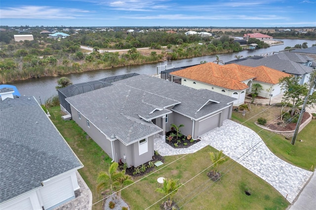 birds eye view of property featuring a water view