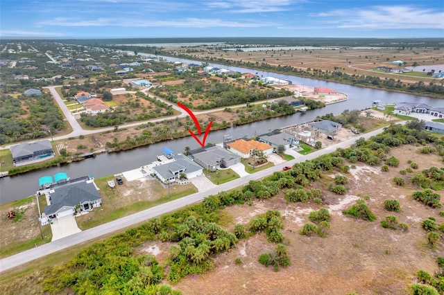 aerial view featuring a water view