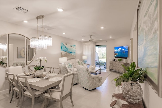 tiled dining room with ceiling fan