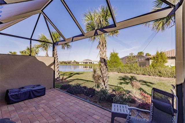 view of patio with a water view