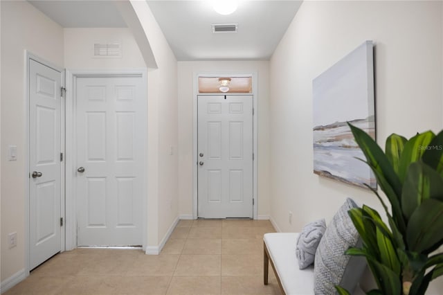 view of tiled foyer entrance