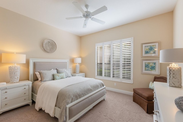 bedroom with light carpet and ceiling fan