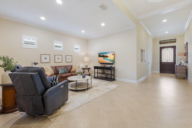 living room with light tile patterned floors and crown molding