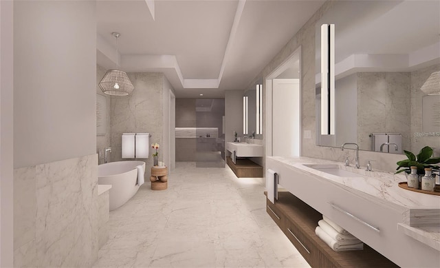 bathroom with vanity, tile walls, and a washtub