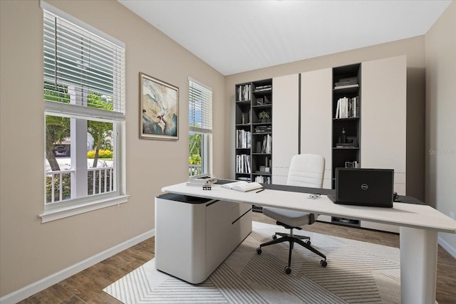 office area with wood-type flooring