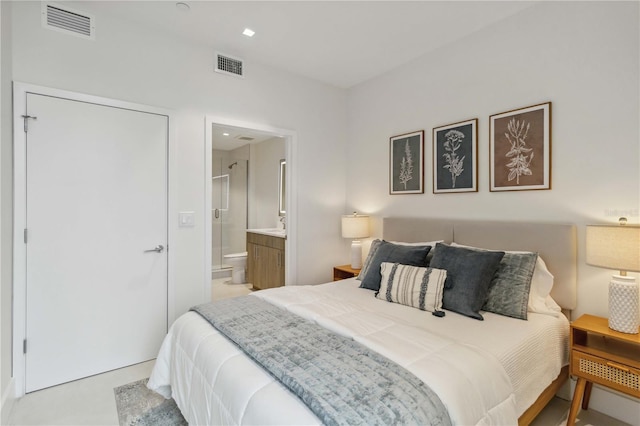 bedroom featuring ensuite bathroom