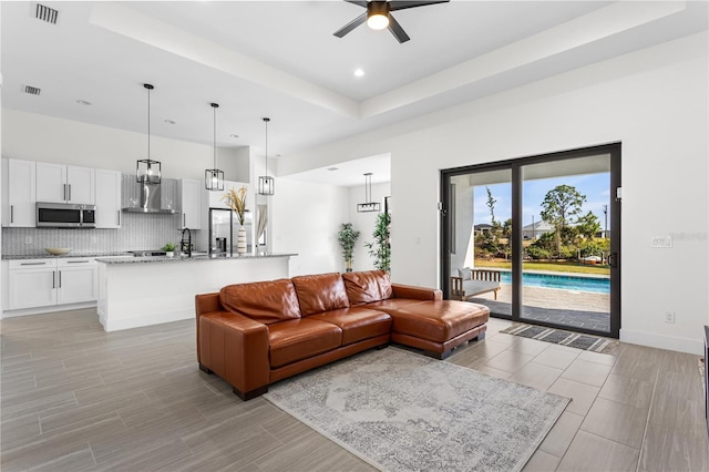 living room with ceiling fan