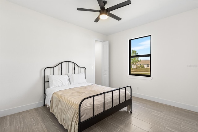 bedroom featuring ceiling fan and light hardwood / wood-style floors