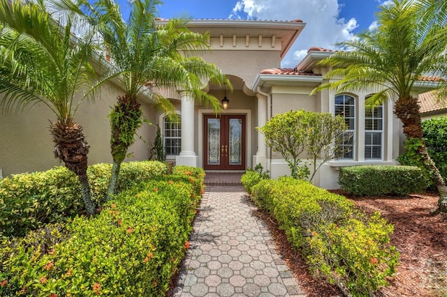 doorway to property featuring french doors