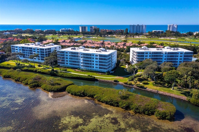 birds eye view of property featuring a water view