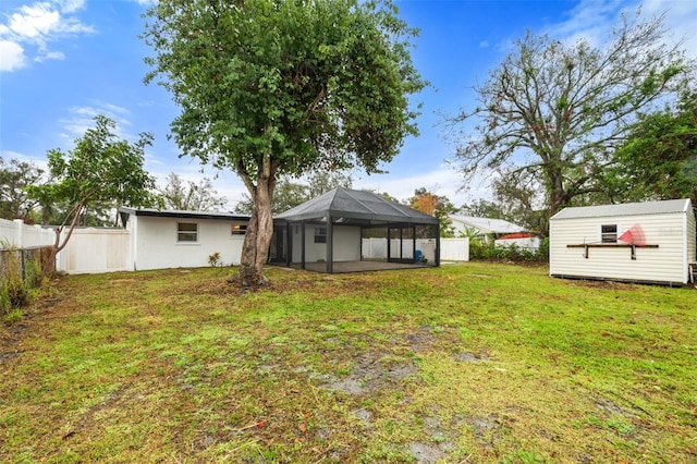 view of yard with a lanai