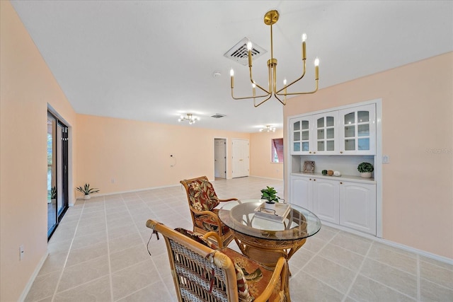 dining room featuring a notable chandelier