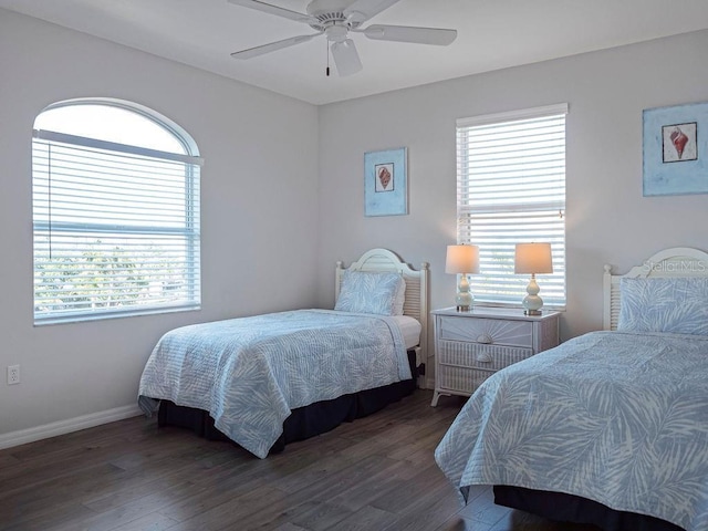 bedroom featuring dark hardwood / wood-style floors and ceiling fan