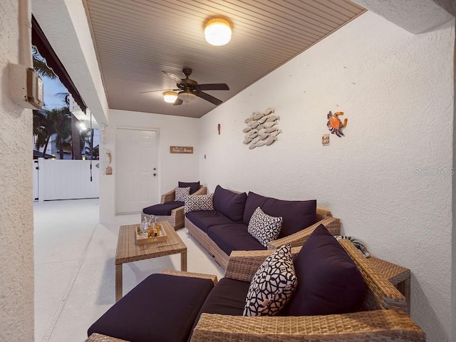 living room featuring ceiling fan